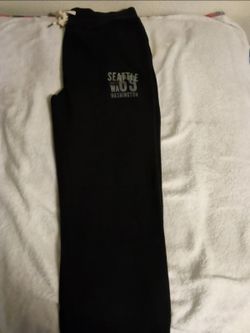 One pair rain jogger sweatpants black in color large in size
