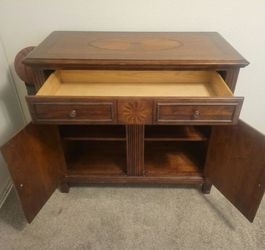 Solid wood furniture for living room or bedroom, used but in good condition."