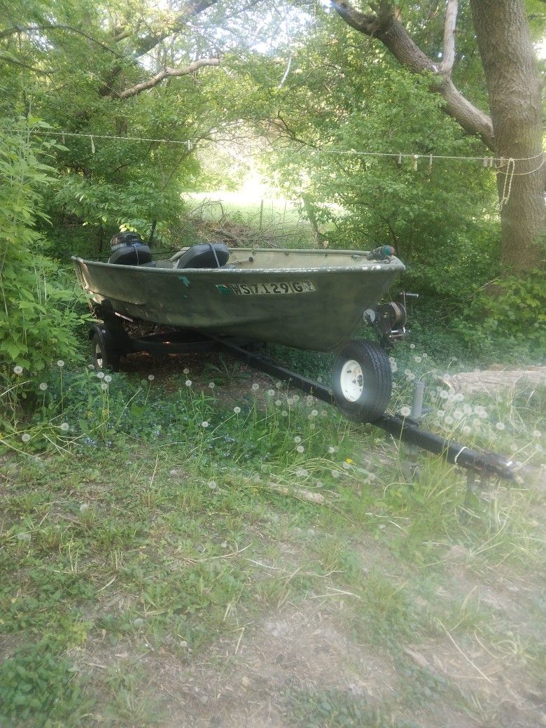 FOR SALE. FISHING BOAT. 1500 HUNDREN. AS IS. MOTOR. TRAILER. TWO SEATS