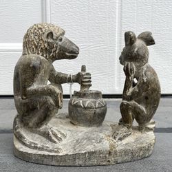 Antique"Whimsical Harmony: The Hare and hyena in a Mystical Stone Ritual"