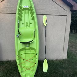 Like- New Pelican Kayak With Paddle 
