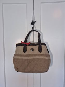 Coach brown and beige striped tote with red bow