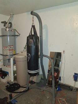 Heavy Bag with stand and workout equipment