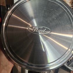 2001 E250. Ford Van Original Hub Caps Set