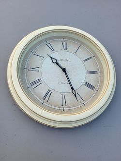E. Main Street round cream analog wall clock