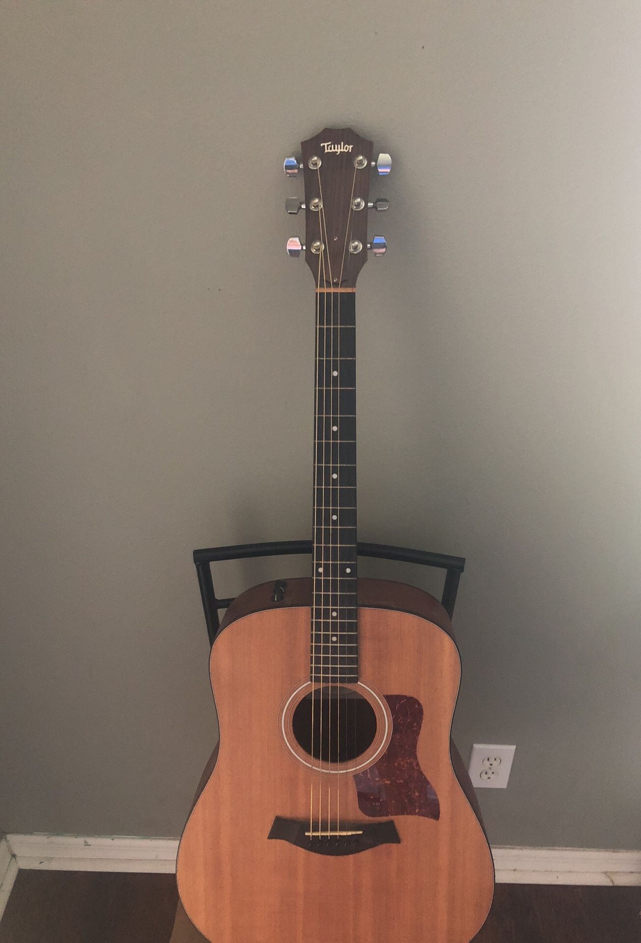 Taylor electric acoustic guitar model 110e, stand, case, cord, and fender amp
