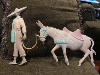 Vintage man pulling mule metal wall figures