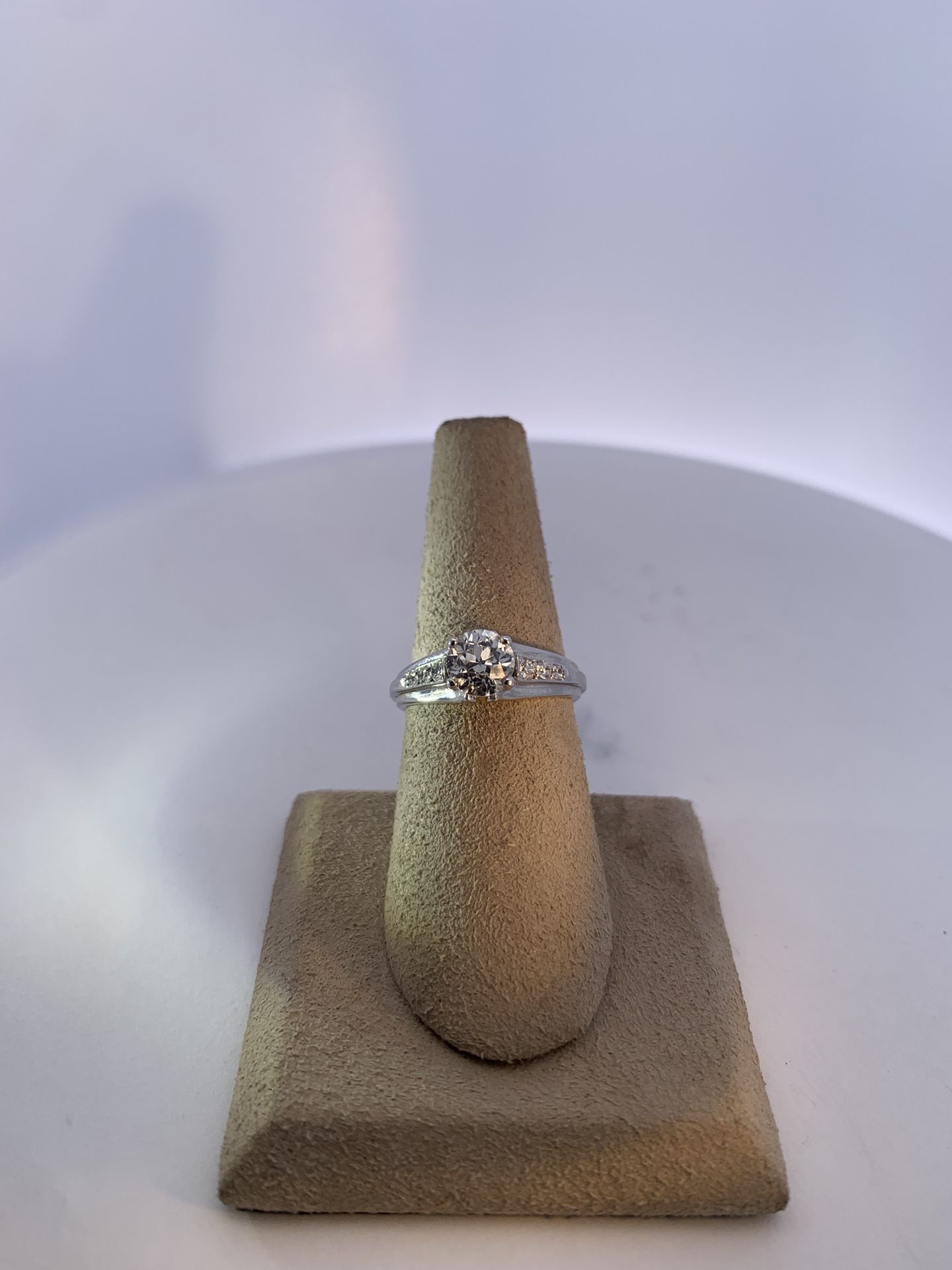 Lady's White 14K *R-2-E Wedding Band Size 7 With One 0.95Ct Round K I1 Diamond And 6=0.09Tw Round H Si1 Diamonds