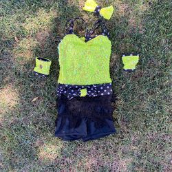 Yellow and black dance costume full of sequin and fringe
