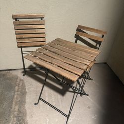 Collapsible Table And Chair Set With White Cushions 