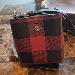 Coach red and black plaid cross body bucket bag