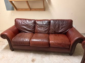 Used dark brown leather sofa - good condition