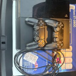 PlayStation 4(500gb), 2 controllers, and cables.