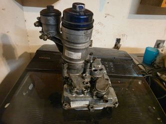 Oil cooler housing with new oil cooler