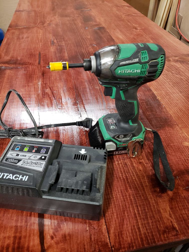 Hitachi Triple hammer drill battery and charger