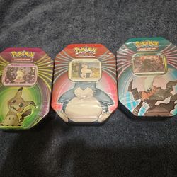 Pokemon Mighty Mysterious Tin Bundle