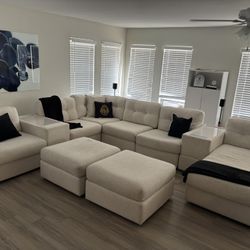 8 Piece Modular Sectional With media Bluetooth Console & 2 Ottomans