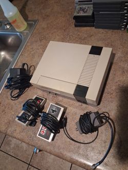 Nintendo NES cleaned and tested comes with all hookups condition is good $80