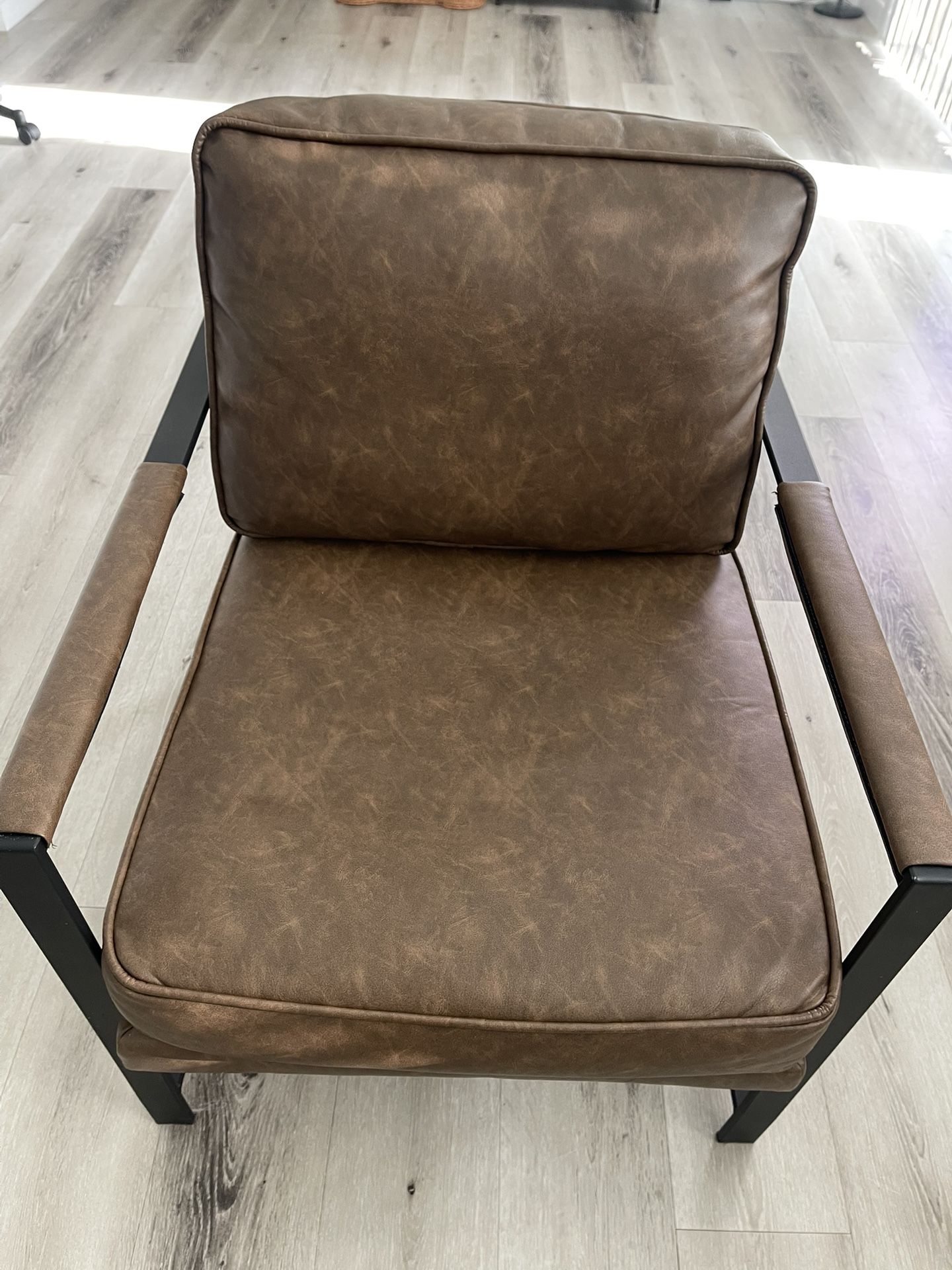 2 Brown Leather armchairs