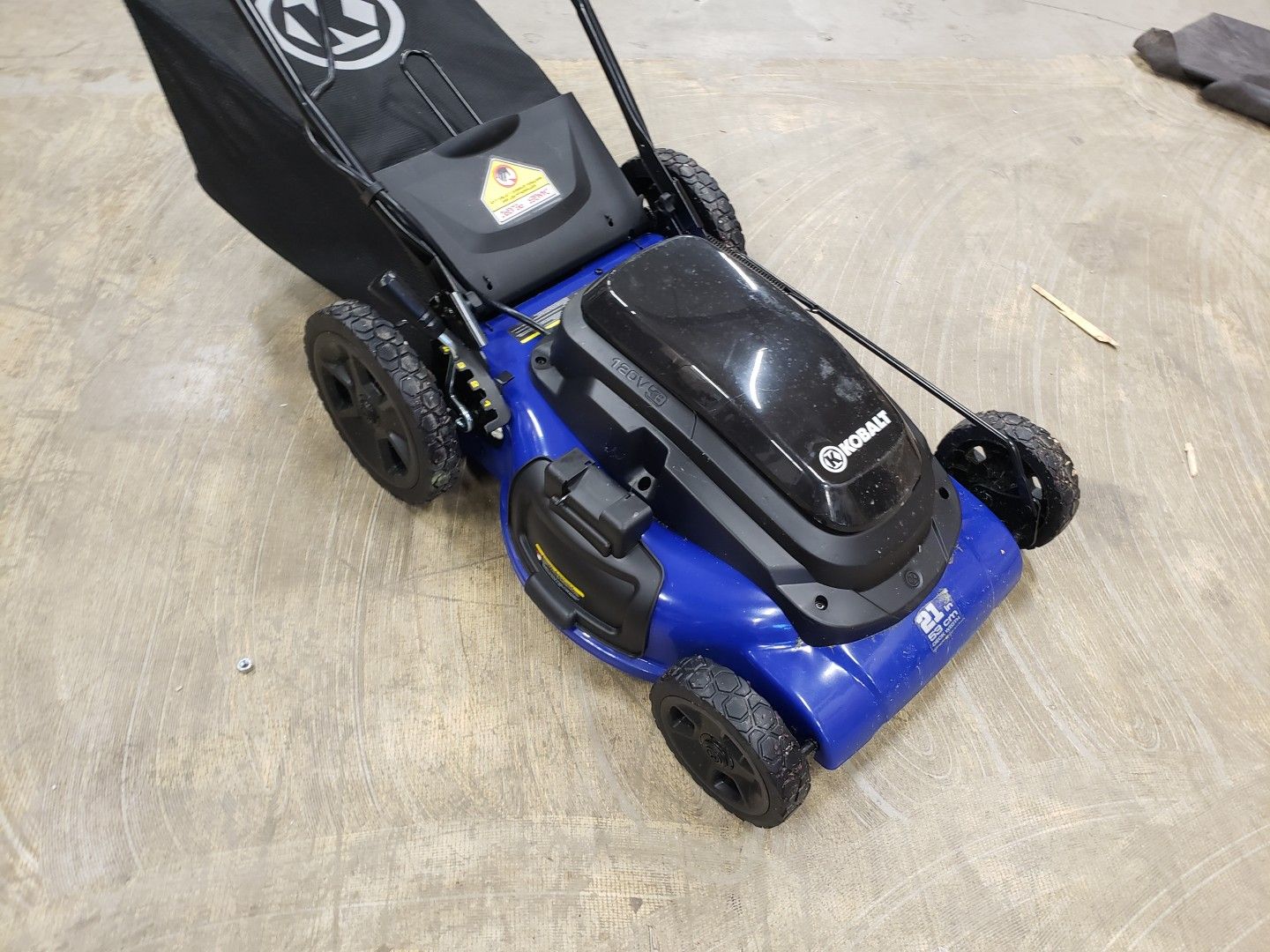 Kobalt corded electric lawn mower. Plugs into extension cord. 120 for