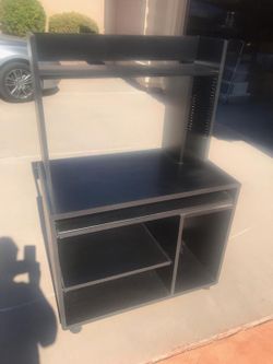 Black Desk with great storage, Wheels, and Slide out Keyboard