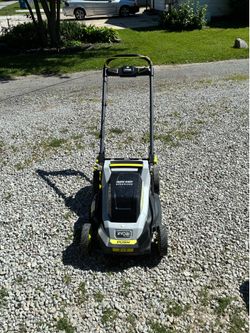 20" Ryobi 40V Push Mower with 4ah battery and slow charger
