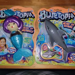 NEW SWIMMING MERMAID OR  SHARK WITH SPLASHING TAILS. FUN FOR BATH OR POOL