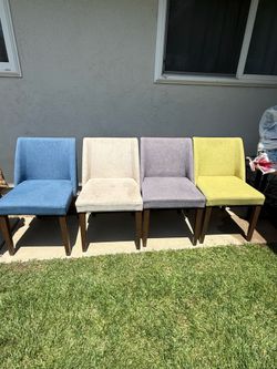 🔥 Modern dining table with cloth multi colored chairs