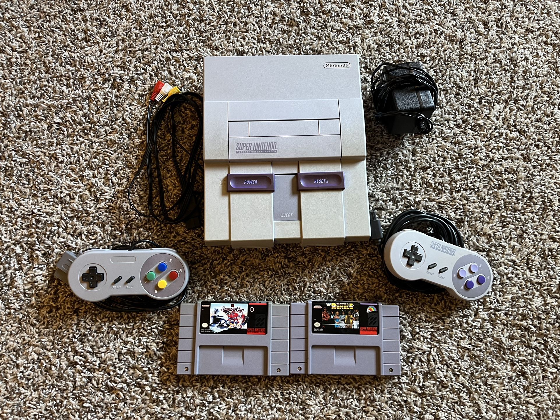 SNES With 2 Controllers And 2 Games