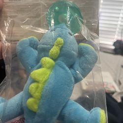 Baby Dinosaur with Pacifier 