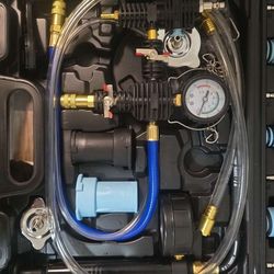 This is a universal radiator pressure tester and vacuum refill kit. It is used for automotive cooling system maintenance