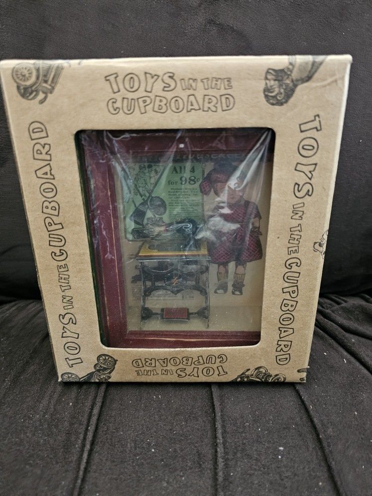 Toys In The Cupboard Sewing Machine