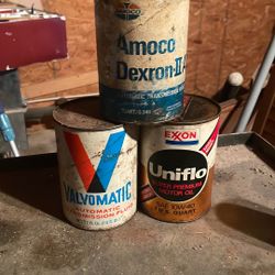 Unopened Oil Cans 