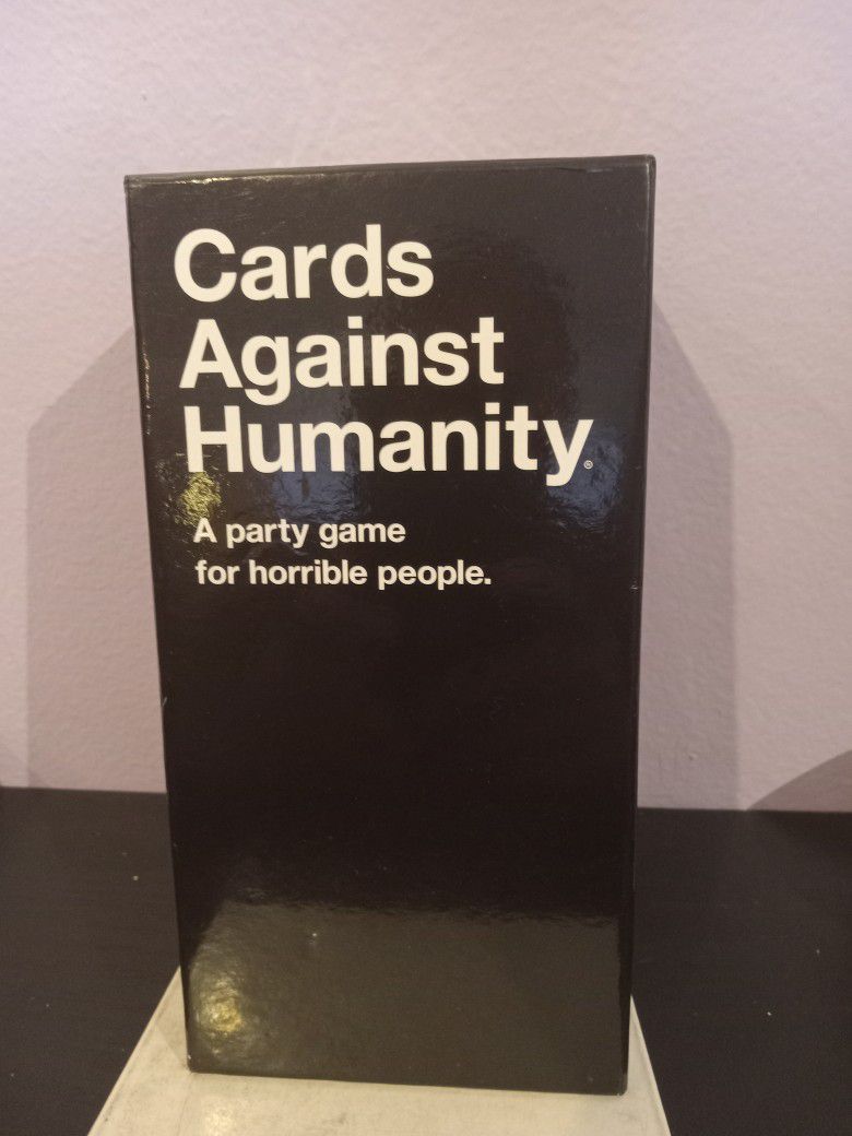 Cards Against Humanity • Main Game open box new selling for only $10.  
