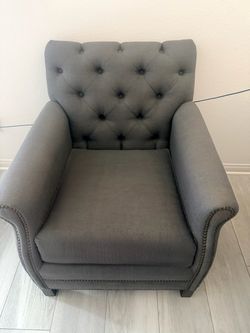 Gray Tufted Accent Chair with Nailhead Trim