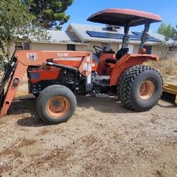 Kubota tractor four by 4  4 speed