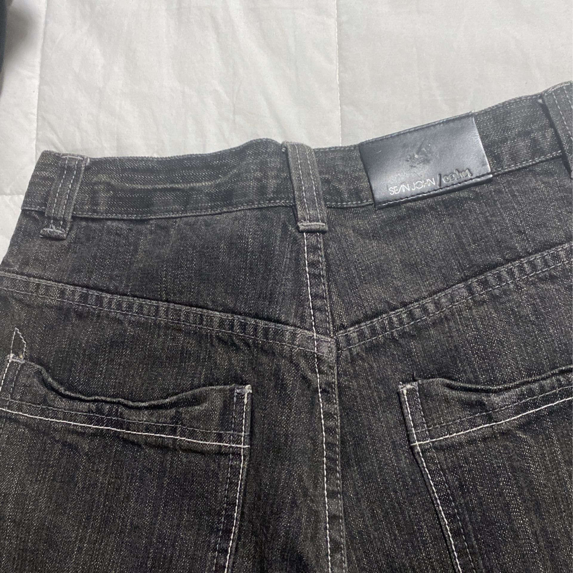 Black pair of boys Sean John shorts