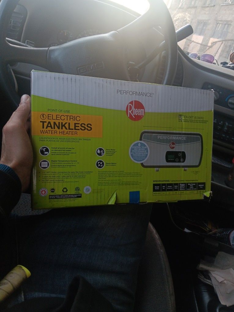 RHEEM ELECTRIC TANKLESS WATER HEATER $175 NEW