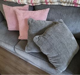 16"x16" Grey Throw Pillows + 20”x20” Pink Throw Pillows. 4 Pcs $20.00 Total. See Below Description: