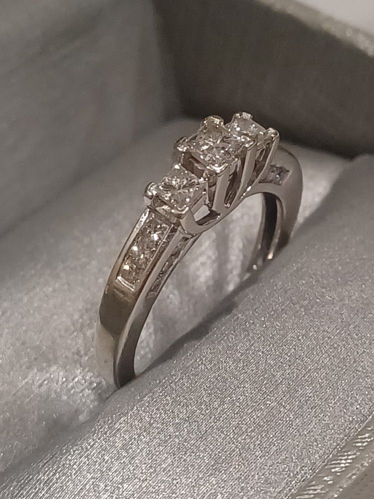 One and a half carrot diamond ring.