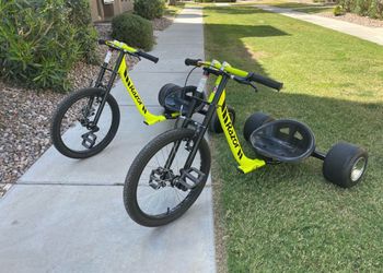 2 Razor DXT Drift Trike 14 years and up, and up to 198 pounds Super Slider POM rear Wheels These trikes are so much fun!!!!!