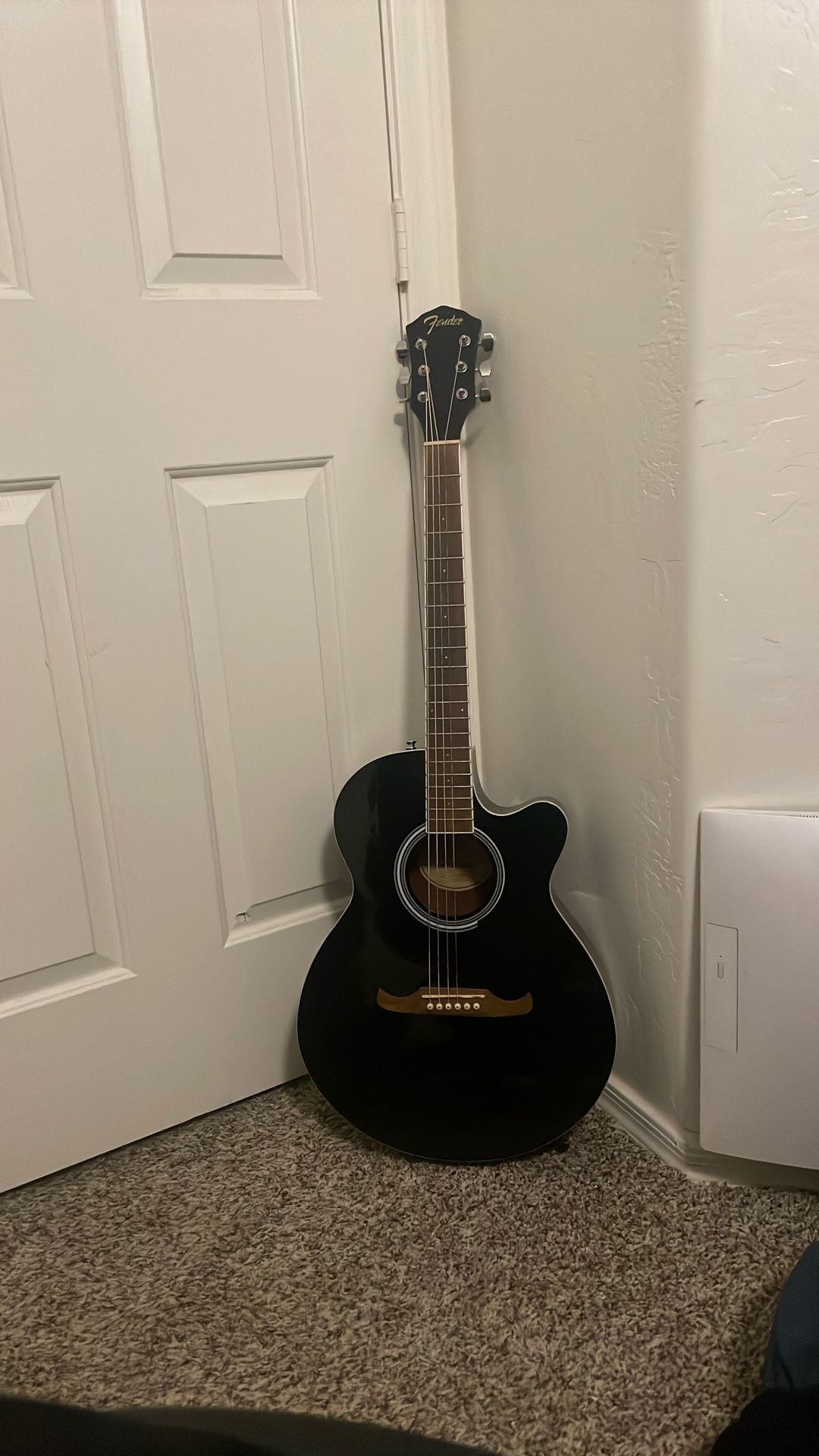 Black Fender Acoustic Guitar