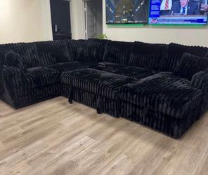 NEW IN BOX - Black Sectional With Pull out bed and STORAGE CHAISE** Finance Available $54 down