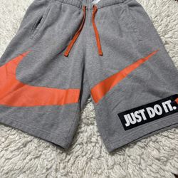 Nike Just Do It men’s short  Medium on tag  Flaws as seen in the last picture (there’s stain but it can be wash)