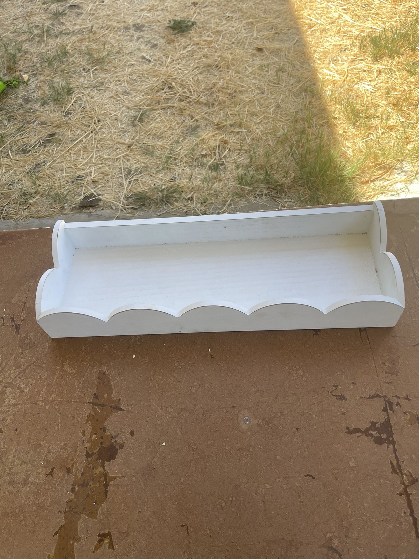 small white hanging shelf