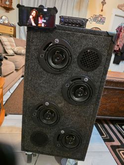 Home made Speaker Cab ---2 10 inch sub bass speakers/ 6 5 inch adjustable level drivers with tweeters....all connected to a brand new Fosi Audio BT3D 