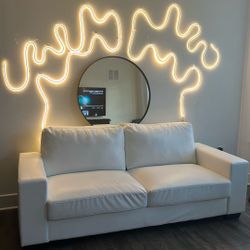 White faux leather couch