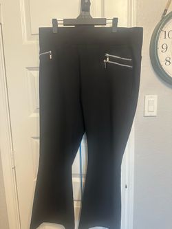 Brand new woman’s dress pants with cute pockets and one you can put the cell phone in
