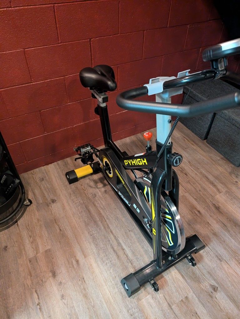 PYHIGH Magnetic Stationary Exercise Bike for Home Indoor Cycling Bikes Excersize Bike Comfortable Seat Cushion Belt Drive Ipad Holder with LCD Monitor