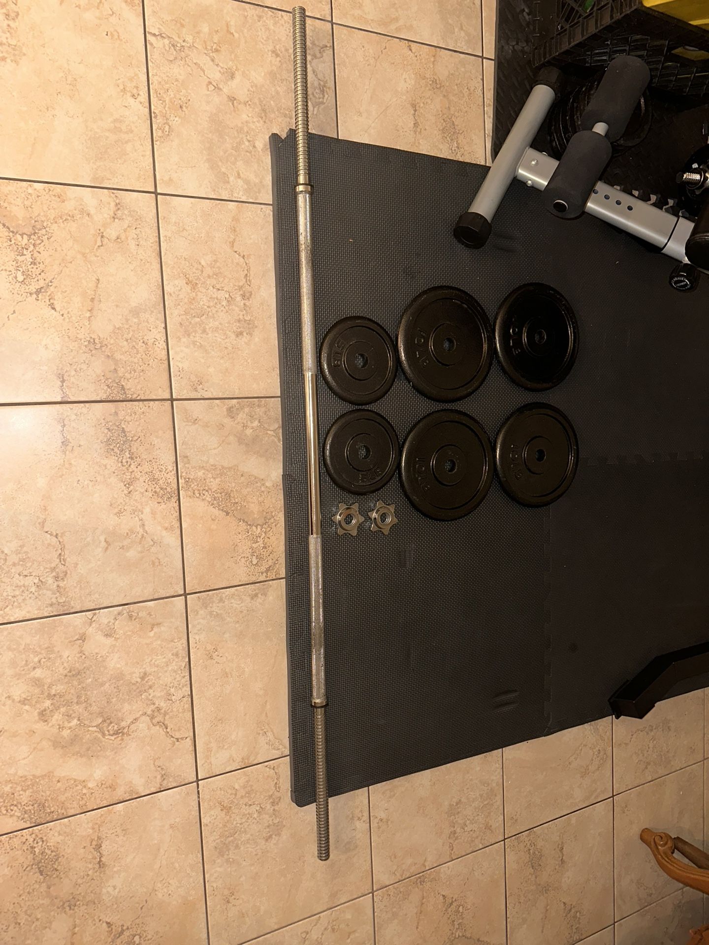 Barbell + 50 Lb Weight Plates
